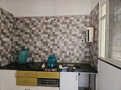 Kitchen Image of 550 Sq.ft 1 BHK Apartment / Flat for rent in Goel Hill Shire, Wagholi Pune for Rs. 14700