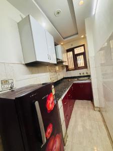 Kitchen Image of 500 Sq.ft 1 BHK Builder Floor for rent in Dwarka Mor New Delhi for Rs. 12500