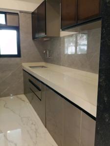Kitchen Image of 850 Sq.ft 2 BHK Apartment / Flat for sale in Rassaz Greens Tower C D And E, Mira Road East Mira Bhayandar for Rs. 12000000