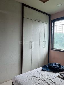 Bedroom Image of 950 Sq.ft 1.5 BHK Apartment / Flat for rent in Kopar Khairane Navi Mumbai for Rs. 34000
