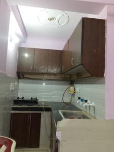 Kitchen Image of 550 Sq.ft 1 BHK Builder Floor for rent in Dwarka Mor New Delhi for Rs. 12000