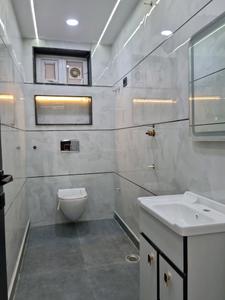 Common Bathroom Image of 1100 Sq.ft 3 BHK Apartment / Flat for sale in Dwarka Mor New Delhi for Rs. 7500000