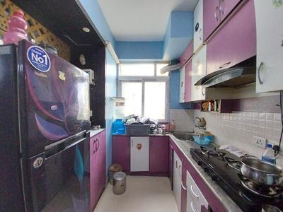 Kitchen Image of 625 Sq.ft 2 BHK Apartment / Flat for rent in Pareena Om Apartments, Sector 112 Gurgaon for Rs. 30000