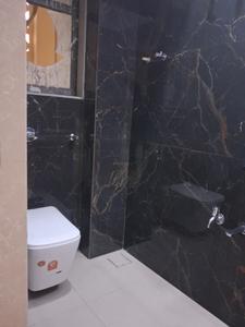 Common Bathroom Image of 547 Sq.ft 1 BHK Apartment / Flat for sale in Kalptaru Srishti Namah, Mira Road East Mira Bhayandar for Rs. 7800000