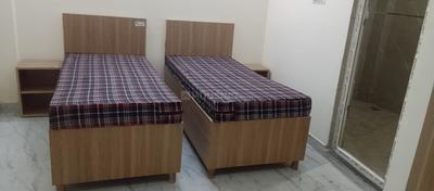 Bedroom Image of Apna niwas pg  in Sector - 106, Noida