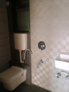 Common Bathroom Image of 659 Sq.ft 1 BHK Apartment / Flat for sale in Amrut Laxmi Raj Regalia Phase I, Ambernath East Ambernath for Rs. 2350000