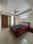 Gulmohar Apartment Bedroom 1
