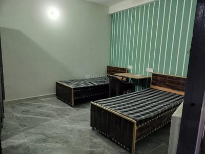 Bedroom Image of raj pg in Sector 22, Noida