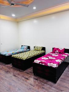 Bedroom Image of Riddhi Siddhi homes(Girls luxury living PG Hostel) in Sector 58, Noida