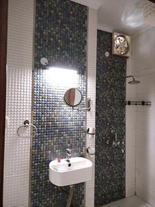 Common Bathroom Image of 950 Sq.ft 2 BHK Apartment / Flat for sale in Suryodaya Apartment, Sector 12 Dwarka New Delhi for Rs. 18500000