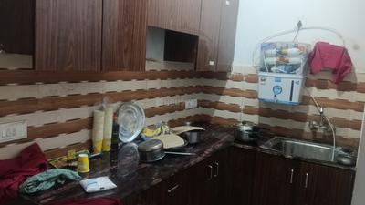 Kitchen Image of 820 Sq.ft 2 BHK Builder Floor for rent in Sector 62A Noida for Rs. 25000