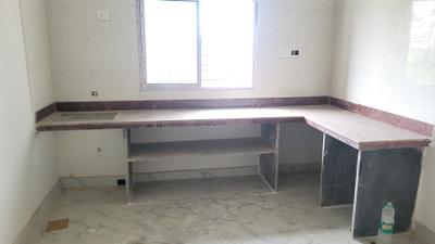 Kitchen Image of 875 Sq.ft 2 BHK Apartment / Flat for sale in Airport Gate No. 3 Kolkata for Rs. 3675000
