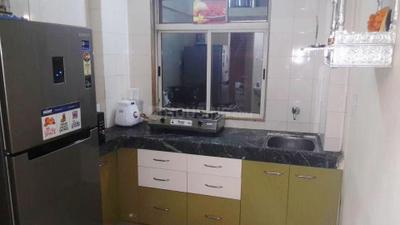 Kitchen Image of 750 Sq.ft 2 BHK Apartment / Flat for sale in Poonam Complex, Mira Road East Mira Bhayandar for Rs. 9000000