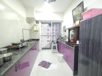 Kitchen Image of 830 Sq.ft 2 BHK Apartment / Flat for sale in Wadhwa Courtyard, Thane West Thane for Rs. 13500000