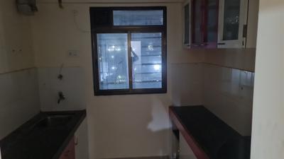 Kitchen Image of 650 Sq.ft 1.5 BHK Apartment / Flat for rent in Squarefeet Grand Square, Kasarvadavali Thane for Rs. 23000