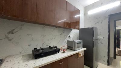 Kitchen Image of 1200 Sq.ft 1 BHK Builder Floor for rent in DLF Phase 1 Gurgaon for Rs. 38000