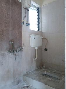 Common Bathroom Image of 650 Sq.ft 1 BHK Apartment / Flat for sale in Unnati Woods Phase 7, Kasarvadavali Thane for Rs. 5600000