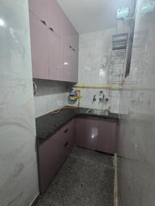 Kitchen Image of 750 Sq.ft 1.5 BHK Builder Floor for rent in Vivek Vihar New Delhi for Rs. 18000