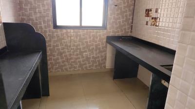 Kitchen Image of 950 Sq.ft 2 BHK Apartment / Flat for rent in Belapur CBD Navi Mumbai for Rs. 46000