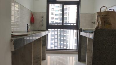 Kitchen Image of 701 Sq.ft 1 BHK Apartment / Flat for sale in Parinee Essence, Kandivali West Mumbai for Rs. 9500000