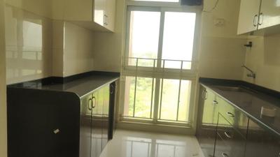 Kitchen Image of 900 Sq.ft 2 BHK Apartment / Flat for rent in Vijay Orovia, Hiranandani Estate Thane for Rs. 34000