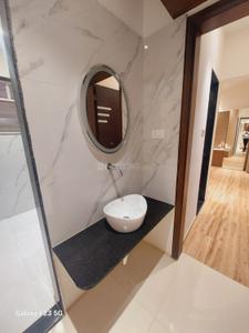 Bathroom Image of 1309 Sq.ft 3 BHK Apartment / Flat for sale in Kiwale Pune for Rs. 8300000