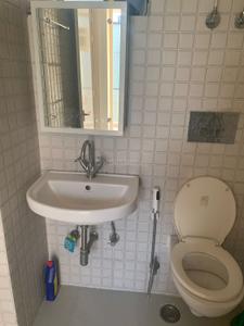 Bathroom Image of 1025 Sq.ft 2 BHK Apartment / Flat for sale in Krish Aura, Milakpur Goojar Bhiwadi for Rs. 3550000