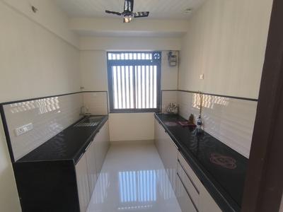 Kitchen Image of 950 Sq.ft 2 BHK Apartment / Flat for rent in Dynamix Divum, Malad East Mumbai for Rs. 70000