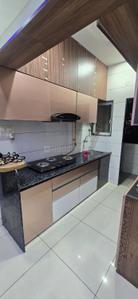 Kitchen Image of 600 Sq.ft 2 BHK Apartment / Flat for rent in DK City Courtyard, Radhika Park Rajkot for Rs. 15000
