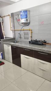 Kitchen Image of 850 Sq.ft 1 BHK Apartment / Flat for rent in Surya Kiran Aakash Homes, Ujala Circle Ahmedabad for Rs. 20999