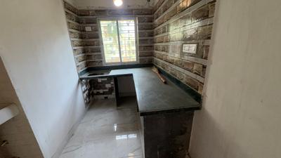 Kitchen Image of 700 Sq.ft 2 BHK Apartment / Flat for sale in Airport Gate No 2 Kolkata for Rs. 2800000