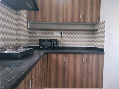 Kitchen Image of 600 Sq.ft 1 BHK Independent House for rent in Domlur Layout Bengaluru for Rs. 60000
