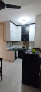 Kitchen Image of 900 Sq.ft 2 BHK Builder Floor for rent in Ramesh Nagar New Delhi for Rs. 31000