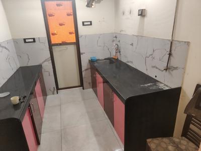 Kitchen Image of 730 Sq.ft 2 BHK Apartment / Flat for rent in Bhoomi Acres, Hiranandani Estate Thane for Rs. 35000
