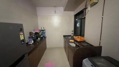 Kitchen Image of 1000 Sq.ft 2 BHK Apartment / Flat for rent in Neelsidhi Jai Balaji CHS, Nerul Navi Mumbai for Rs. 60000