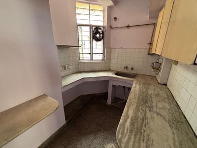 Kitchen Image of 810 Sq.ft 2 BHK Apartment / Flat for sale in Antariksha Apartments, Vikaspuri New Delhi for Rs. 9500000