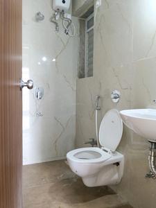 Common Bathroom Image of 550 Sq.ft 1 BHK Apartment / Flat for rent in Raunak Bliss Phase A by Raunak Group, Kasarvadavali Thane for Rs. 25655