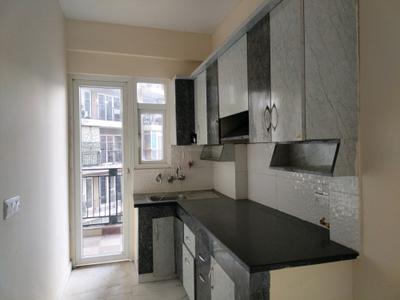 Kitchen Image of 1060 Sq.ft 2 BHK Apartment / Flat for sale in Uppal Casa Woodstock, Noida Extension Greater Noida for Rs. 8000000