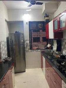 Kitchen Image of 680 Sq.ft 1.5 BHK Apartment / Flat for rent in Kashish Park, Dharamveer Nagar Thane for Rs. 40000