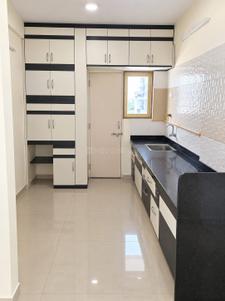 Kitchen Image of 850 Sq.ft 2 BHK Apartment / Flat for rent in Poddar Palm Greens, Makarba Ahmedabad for Rs. 24000