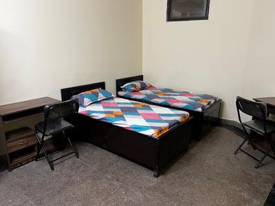 Bedroom Image of VAISHNO PG in Sewak Park, New Delhi