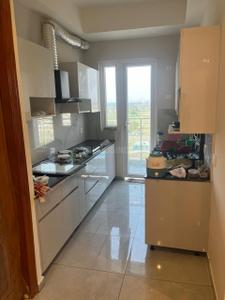 Kitchen Image of 1200 Sq.ft 3 BHK Apartment / Flat for rent in T Homes Phase 1, Siddharth Vihar Ghaziabad for Rs. 38000