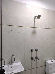 Common Bathroom Image of 538 Sq.ft 2 BHK Builder Floor for sale in Mahavir Enclave New Delhi for Rs. 5000000