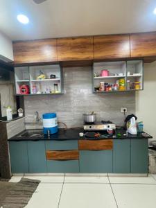 Kitchen Image of 1000 Sq.ft 2 BHK Apartment / Flat for rent in Sunbuildcon Suryansh Sanidhya Shivalaya, Sarkhej Ahmedabad for Rs. 25000