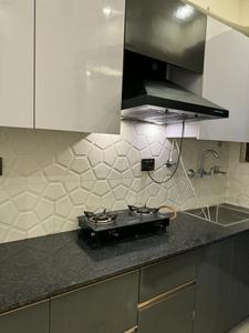 Kitchen Image of 890 Sq.ft 2 BHK Builder Floor for rent in Rajouri Garden New Delhi for Rs. 32000