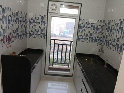 Kitchen Image of 596 Sq.ft 1 BHK Apartment / Flat for rent in Raunak Bliss, Kasarvadavali Thane for Rs. 20000