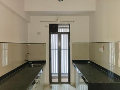 Kitchen Image of 780 Sq.ft 2 BHK Apartment / Flat for rent in Runwal My City Phase II Cluster 5 Part III, Usarghar Thane for Rs. 15000