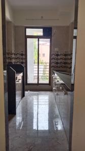 Kitchen Image of 980 Sq.ft 2 BHK Apartment / Flat for sale in Vasai West Vasai for Rs. 7500000