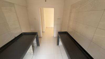 Kitchen Image of 1000 Sq.ft 2 BHK Apartment / Flat for sale in Sudarshan Sky Heights, Thane West Thane for Rs. 8600000