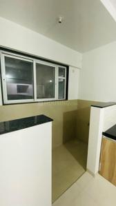 Kitchen Image of 990 Sq.ft 2 BHK Apartment / Flat for sale in Swamiraj Swami Kedar, Yewalewadi Pune for Rs. 5800000